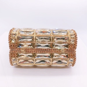 Elegant gold cylindrical rhinestone clutch bag with luxury crystal mesh for evening parties