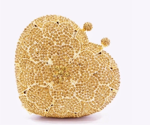 Golden heart-shaped evening clutch bag with sparkling floral crystal rhinestone patterns