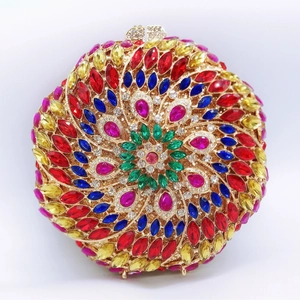Detailed close-up of a round evening clutch with vibrant multicolored spiral rhinestones