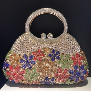 Luxury rhinestone evening clutch with colorful floral pattern and golden ring handle