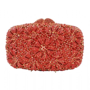 Detail of red rhinestone evening clutch featuring a hollow dandelion flower pattern