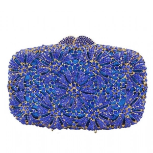 Detailed view of royal blue crystal clutch bag with floral rhinestone patterns