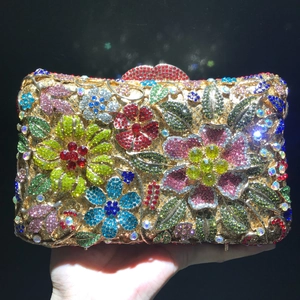 Exquisite floral diamond clutch with colorful rhinestones on a golden frame