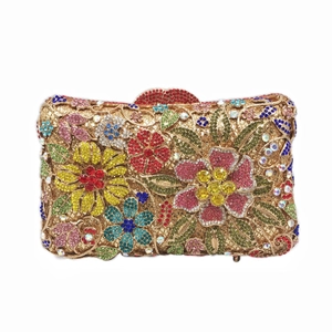 Detailed shot of floral crystal pattern on a champagne gold diamond clutch bag