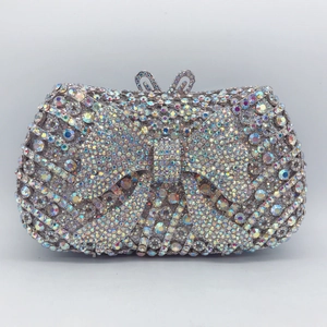 Luxury rhinestone evening clutch bag with hollow bow design and sparkling AB diamonds