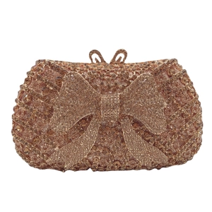 Luxury champagne gold bow evening clutch bag with sparkling rhinestones and metal handle