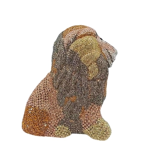 Macro shot of a dog-shaped evening clutch bag with intricate multi-color rhinestone inlay