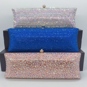 Sparkling crystal rhinestone evening clutch bag in silver, blue and rose gold finishes