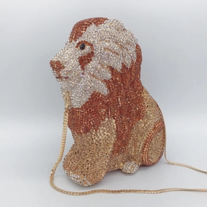 Detailed macro view of a luxury lion animal evening bag with sparkling crystal rhinestones