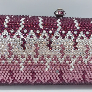 Macro shot of gradient crystal evening clutch bag with handcrafted rhinestones