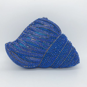 Elegant conch-shaped evening bag with deep blue rhinestones and gradient shell design