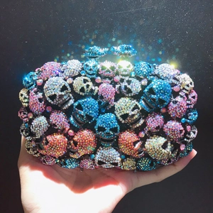 Luxury skull crystal evening clutch bag featuring colorful rhinestones and punk skull clasp
