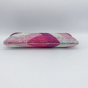 Detailed view of colorful diagonal rhinestone pattern on a rectangular evening clutch
