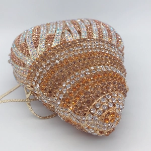 Luxury conch-shaped evening clutch bag with sparkling rhinestones and gold chain