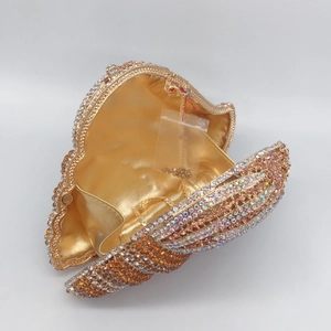 Conch shell crystal evening clutch with colorful rhinestones and gold interior
