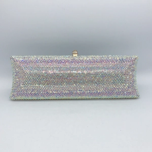 Close-up of multicolor AB rhinestones on the luxury clutch with a gold clasp