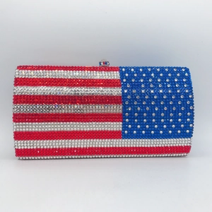 Macro view of crystal encrusted American flag evening clutch with metal locking clasp