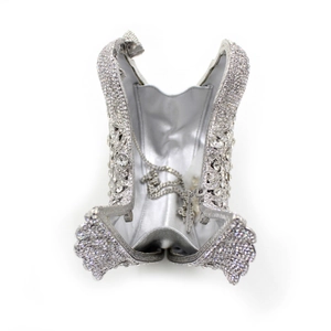 Detailed interior of the silver rhinestone clutch bag with satin lining and chain