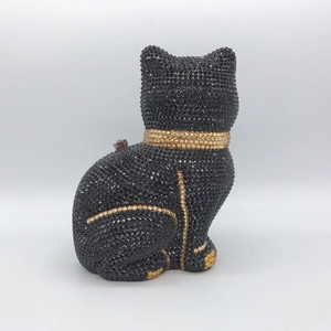 Elegant cat shaped evening clutch bag fully covered in sparkling black rhinestones