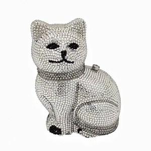 Detailed close-up of handmade cat-shaped clutch bag with full sparkling crystal rhinestones