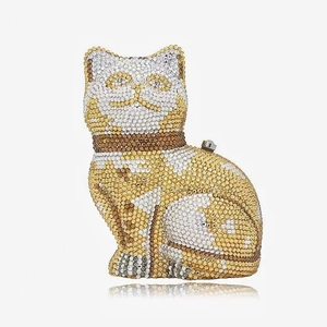 Macro detail of luxury cat evening clutch with glittering yellow and white rhinestones