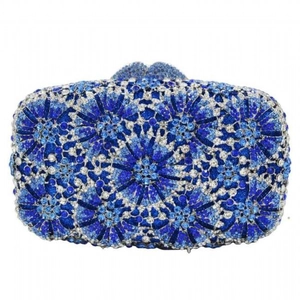 Close-up of blue floral rhinestone pattern on evening clutch bag with metal frame