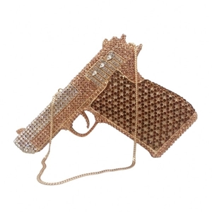 Luxury gun-shaped evening clutch bag with sparkling rhinestones and gold chain strap
