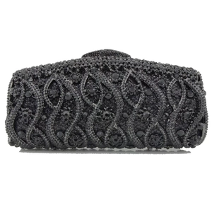 Luxury black crystal clutch bag with elegant wave and floral beadwork for evening events