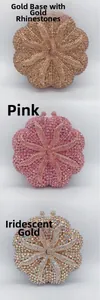 Detailed comparison of 3D floral evening clutch bags in gold, pink, and iridescent crystals