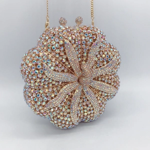 Luxury pumpkin shaped evening bag with sparkling colorful rhinestones and gold chain