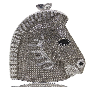 Detailed view of horse head clutch with silver rhinestones and butterfly clasp