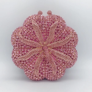 Pink rhinestone floral evening clutch bag with sparkling crystal flower petals and metal clasp