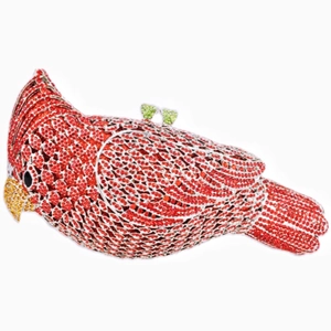 Detail of red cardinal bird clutch bag with sparkling rhinestones and green gem topper