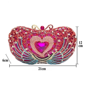 Detail view of heart-shaped crystal evening clutch with dimensions 21cm x 12cm x 6cm