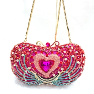 Luxury heart-shaped evening clutch with multi-colored crystals and gold chain strap