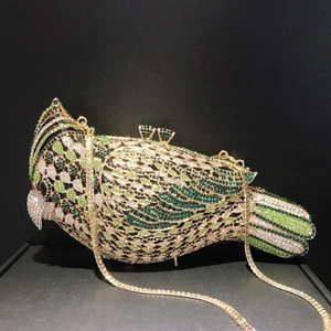 Luxury parrot-shaped evening clutch bag with sparkling green rhinestones and gold chain