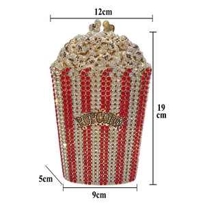 Sparkling popcorn shape evening clutch bag with red and white rhinestones and gold hardware