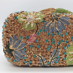 Luxury floral crystal evening clutch with blue and green rhinestone patterns in gold finish