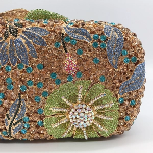 Luxurious floral rhinestone evening clutch bag with emerald flowers and blue leaves