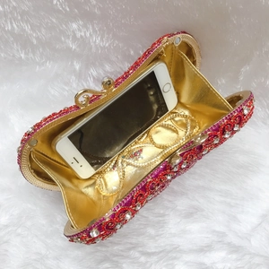Luxury heart-shaped evening bag with red gradient crystals and gold chain strap