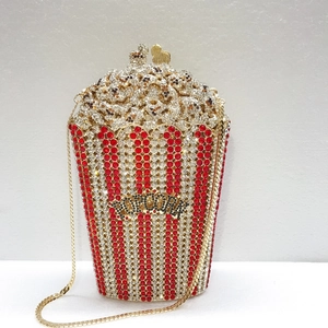 Luxury popcorn clutch evening bag with red and white rhinestones and a gold chain strap