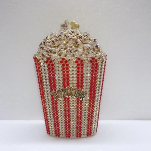 Exquisite popcorn shape clutch with hand-set red and white rhinestones and gold details