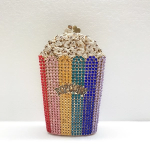 Detail of colorful crystal popcorn clutch bag with luxury rhinestones and popcorn motif
