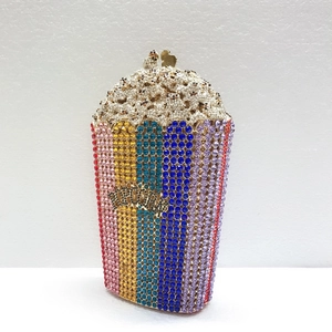 Detailed close-up of a popcorn-shaped evening clutch with colorful sparkling rhinestones