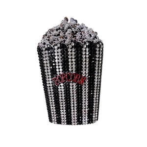 Sparkling popcorn bucket evening clutch bag with crystal pavé and red POPCORN lettering