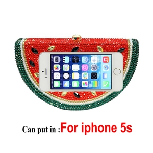 Detailed view of watermelon shaped clutch bag showing capacity for a compact phone