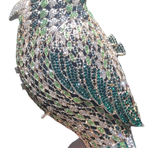 Exquisite bird-shaped evening clutch bag encrusted with green and white crystals