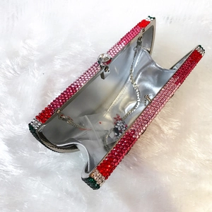 Watermelon crystal clutch bag with vibrant red and green rhinestones and metal chain