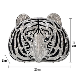 Tiger head evening clutch with dimensions 20cm x 14cm x 8cm and rhinestone embellishments