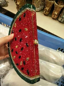 Sparkling watermelon shaped clutch bag with red crystals and green rhinestone border